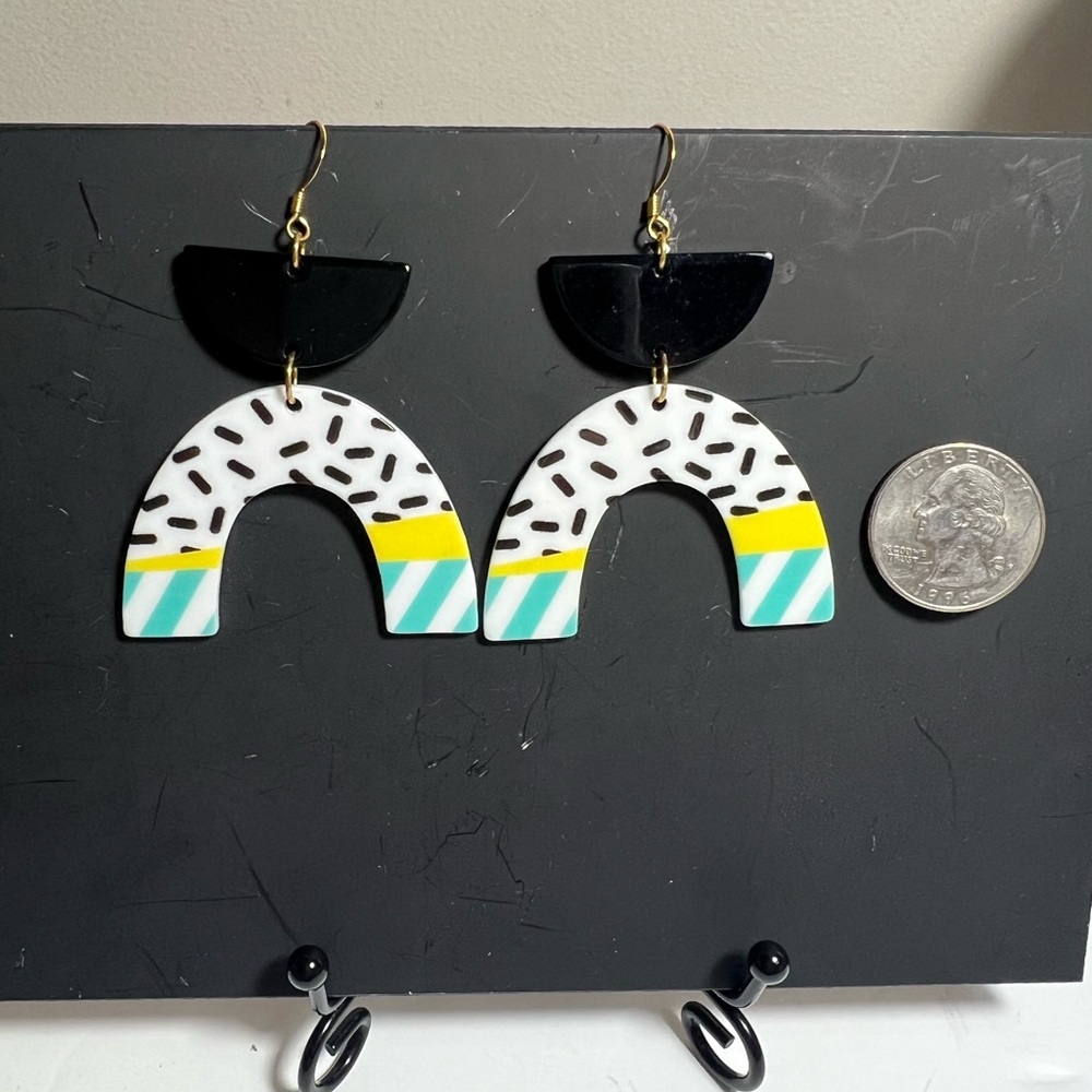 Retro style acrylic earrings. These are just cute as a button very lightweight
.